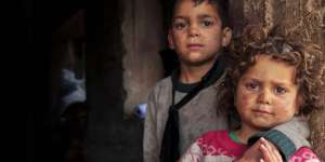 To Hear Children Weeping in a Photograph