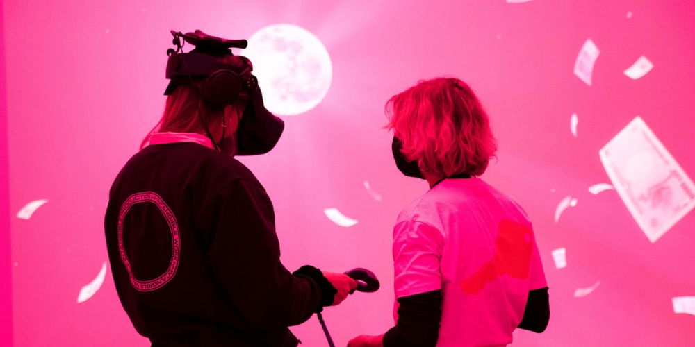 an image of two people in VR headsets