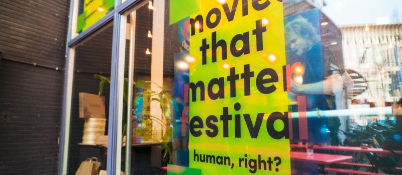 a stack of newspapers at the movies that matter festival